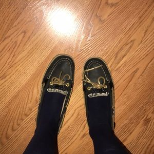 Navy blue and cheetah print boat shoes